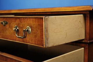 Each drawer features hand cut dovetailed joints, just like they used