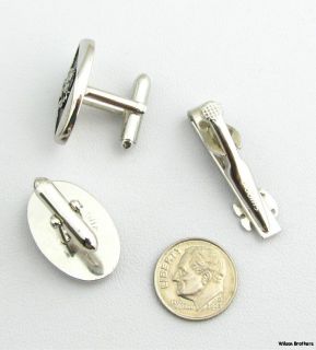 This set weighs 20.8 grams . Each cuff link has 15/16 (24.5mm) wide
