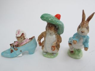 Of 3 Beatrix Potter Figurines  Old Woman, Benjamin Bunny, Peter Rabbit