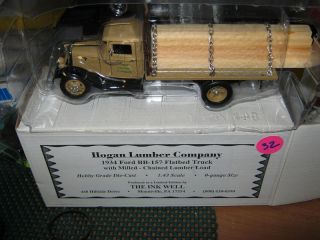 1934 DIE CAST EVERGREEN LUMBER MILL TRUCK W/CHAINED LUMBER LOAD  FOR