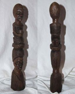 height 13 base width 2 1 2 man and woman totem pole type wood