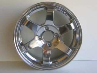 You are bidding on a set of 4 wheels and 4 center caps. The pictures