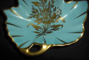 This elegant, sky blue and gold piece is 4.25 long x 4.125 wide and
