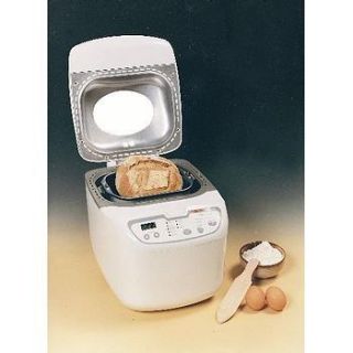 Machine à pain   Puissance 715 watts   Surface des parois froides